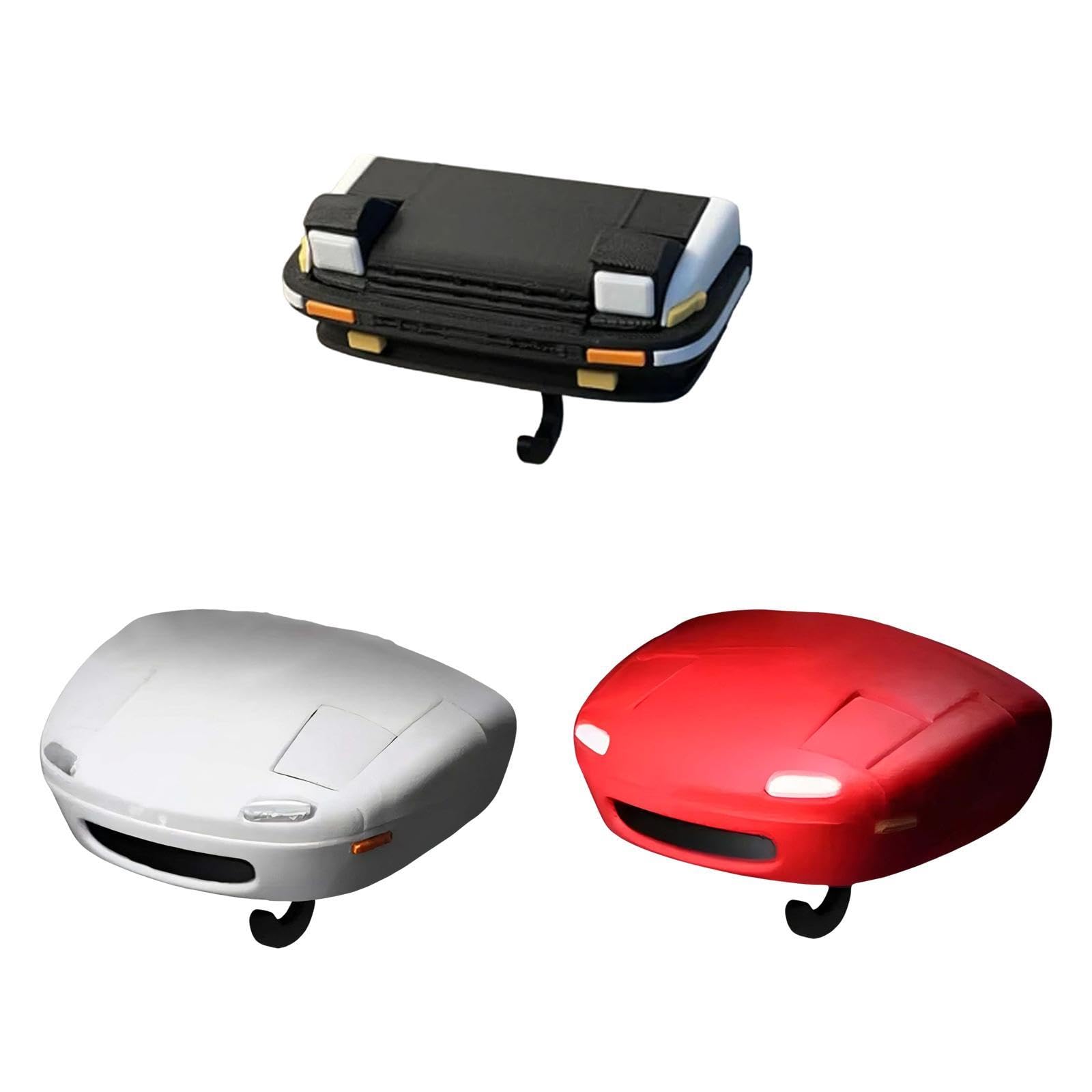 Three car roof boxes in black, white, and red on a white background