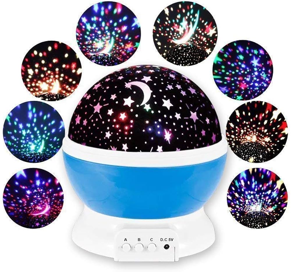 Starry night light projector with colorful light patterns on a white background