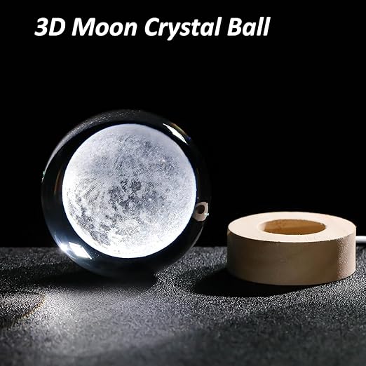3D Moon Crystal Ball with wooden base on a dark surface