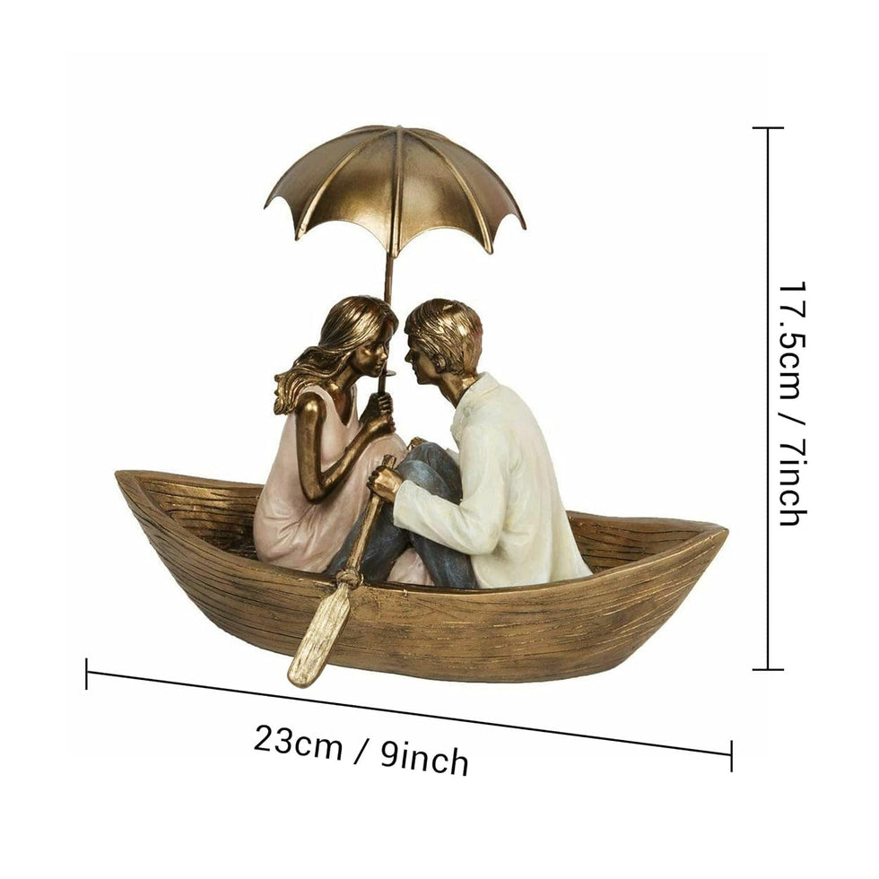 Statue of a couple in a boat with an umbrella, dimensions indicated.